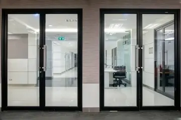 Safety Meets Elegance: Steel Door with Glass for Bright Spaces